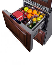 Summit SWCDRF24PNR panel-ready 24 in wine refrigerator with refrigerator-freezer drawers, upper drawer open with food, custom wood panel