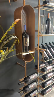 Close-up of Fittings gold wine walls with bottles and glasses, video by Fittings