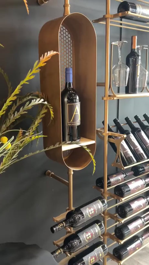 Close-up of Fittings gold wine walls with bottles and glasses, video by Fittings
